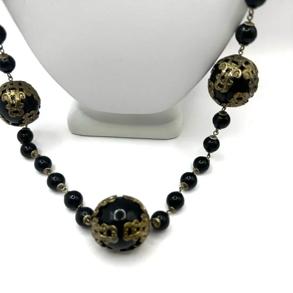 Vintage long black beaded necklace